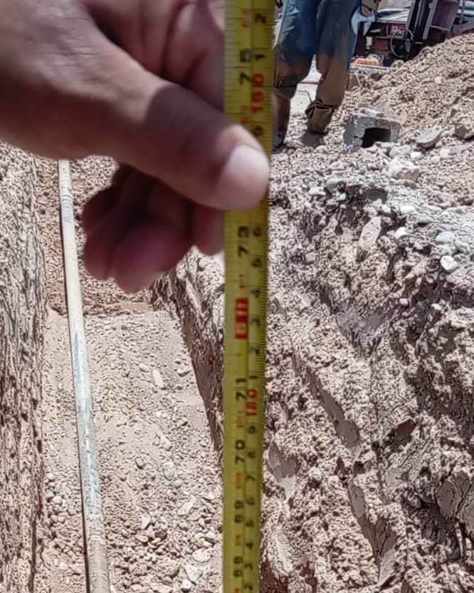 Checking depth in the trench